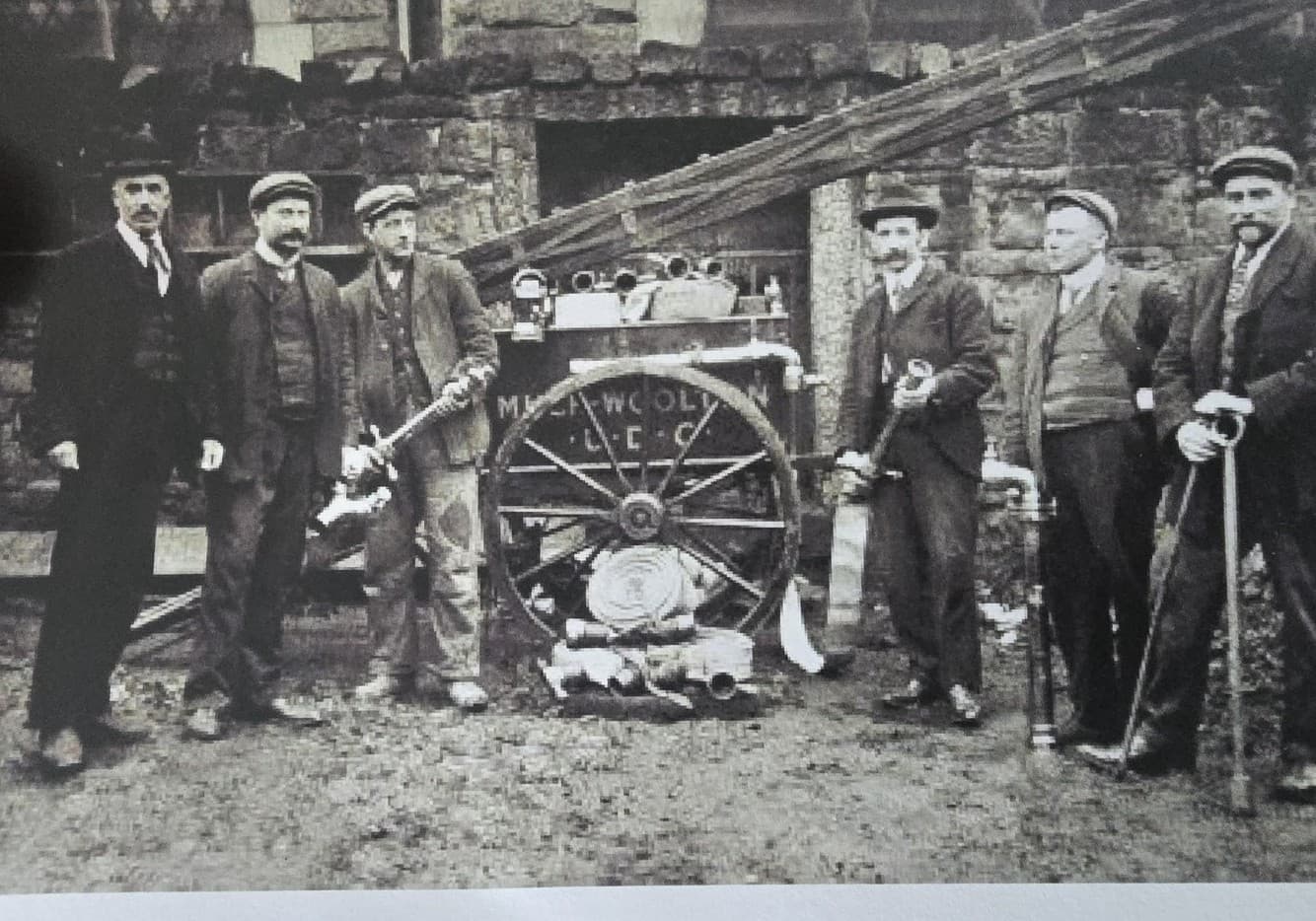 Historic photograph of Woolton firefighters and firefighting equipment at Woolton Baths
